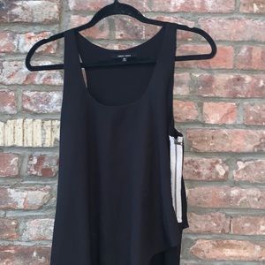 Asymmetrical black chiffon dress with side zipper.
